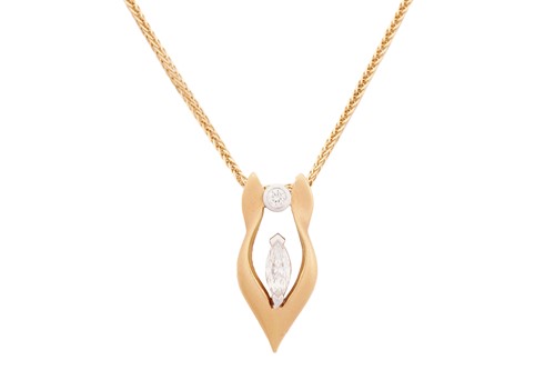 Lot 22 - An 18-carat gold and diamond pendant. with a...
