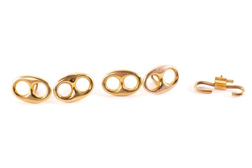 Lot 70 - A set of four shirt studs of anchor link...