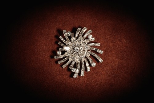 Lot 233 - Van Cleef & Arpels - A floral spray brooch set...