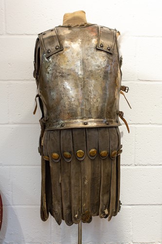 Lot 604 - A partial suit of film prop Roman armour in...