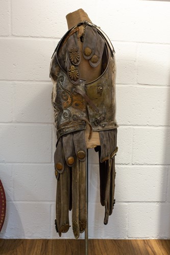 Lot 604 - A partial suit of film prop Roman armour in...