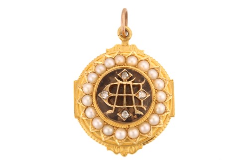 Lot 247 - A 19th-century gem-set pendant, containing a...
