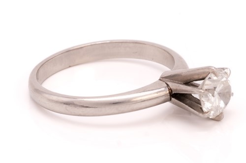 Lot 90 - A diamond solitaire ring, centred with a...