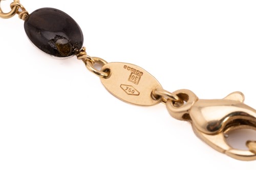 Lot 57 - A multi-gem bead necklace in 18ct yellow gold,...