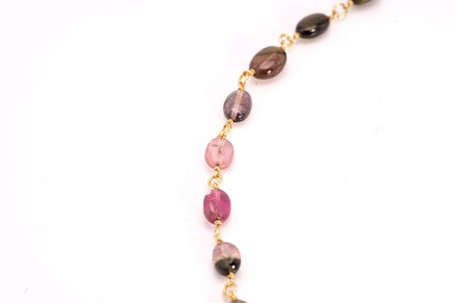 Lot 57 - A multi-gem bead necklace in 18ct yellow gold,...