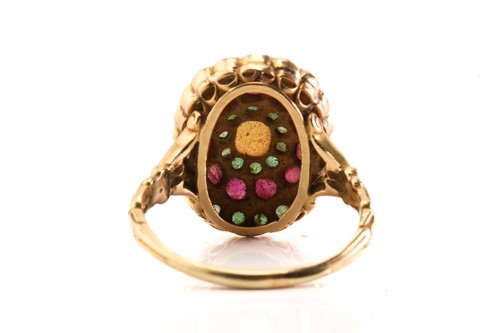 Lot 8 - A yellow metal, ruby, emerald, and opal dress...