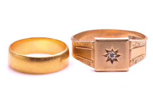 Lot 33 - A 22ct gold wedding band and a 9ct gold signet...