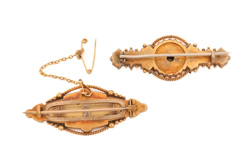 Lot 12 - Two Etruscan Revival diamond-set brooches in...