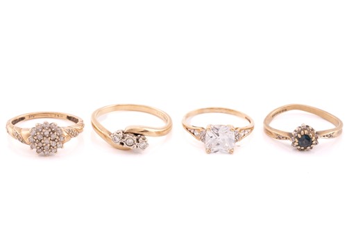 Lot 39 - A 9ct yellow gold and diamond three stone...