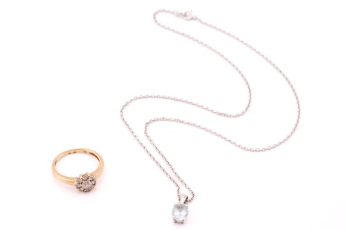 Lot 31 - A 9ct white gold and single stone aquamarine...