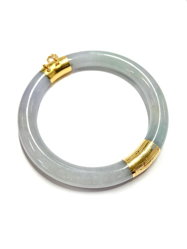 Lot 53 - A green and lavender jadeite hinged bangle,...