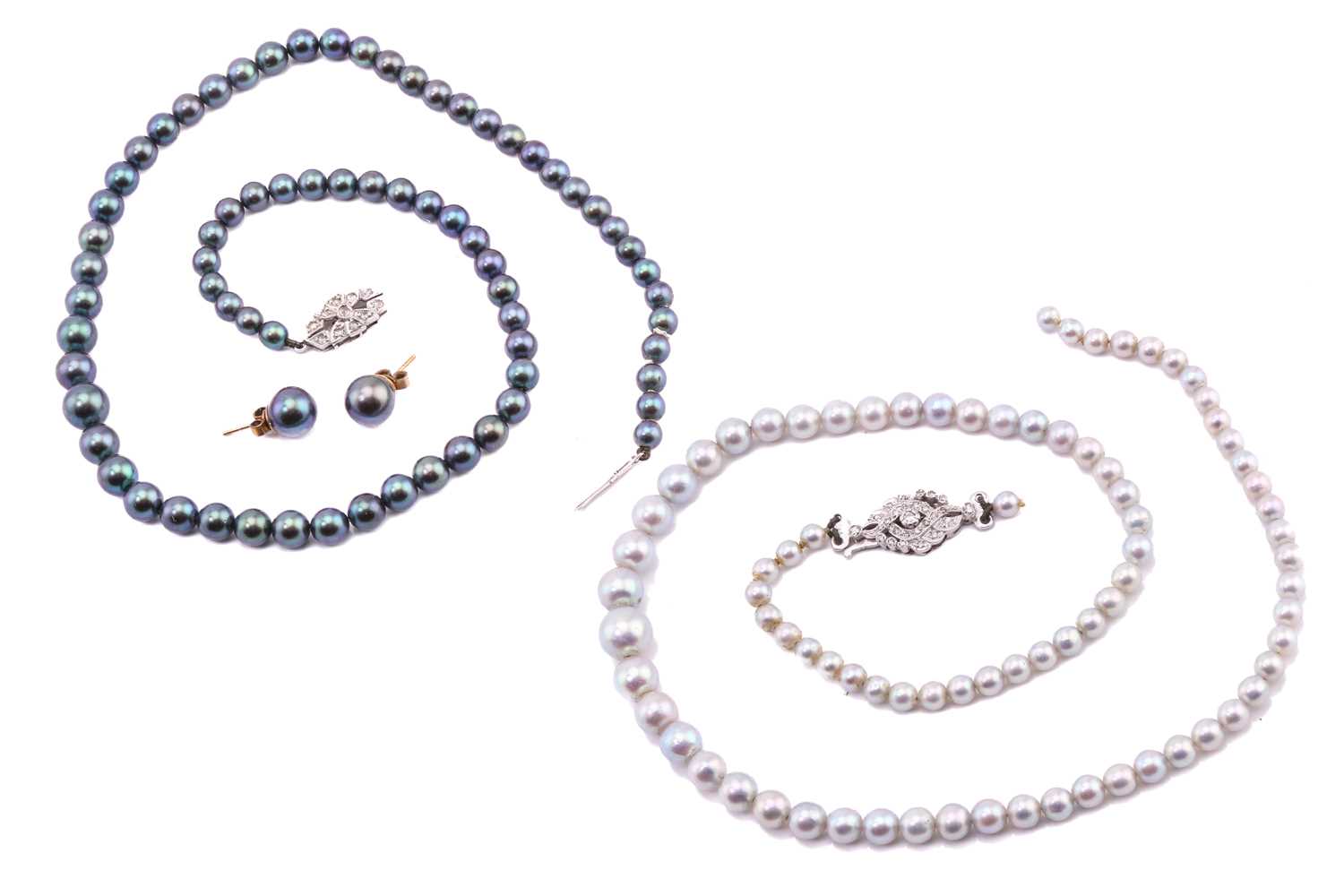 Lot 15 - Two pearl necklaces, comprising a single...