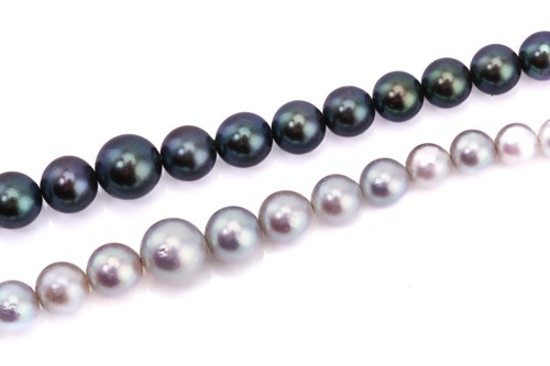 Lot 15 - Two pearl necklaces, comprising a single...