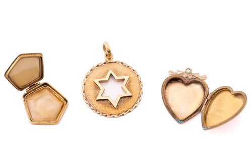 Lot 163 - A yellow metal Star of David pendant, circular...