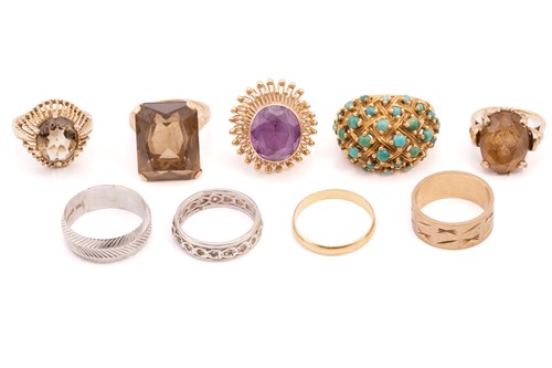 Lot 160 - A collection of nine rings; to include a...