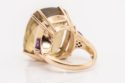 Lot 151 - A large citrine and amethyst cocktail ring,...