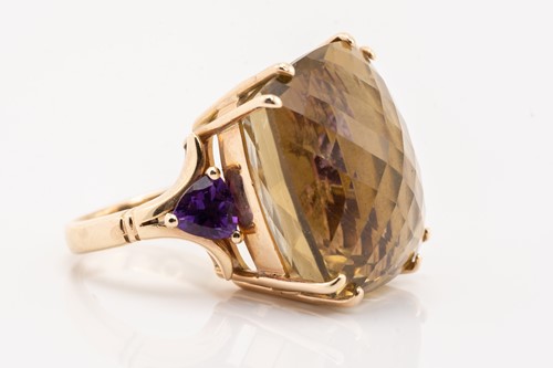 Lot 151 - A large citrine and amethyst cocktail ring,...