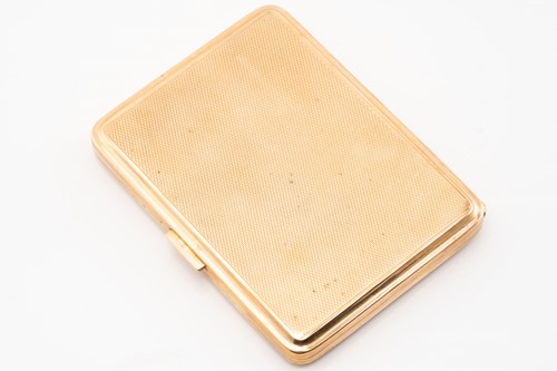 Lot 248 - A 9ct yellow gold cigarette case, with engine...