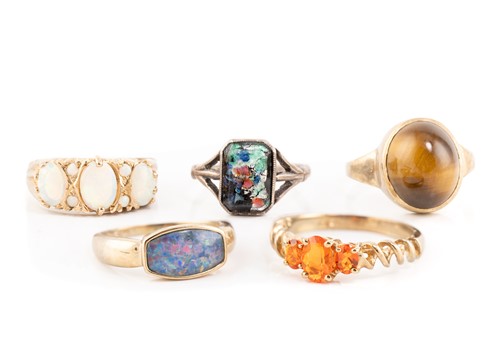 Lot 306 - Four gem-set rings in 9ct gold and another;...