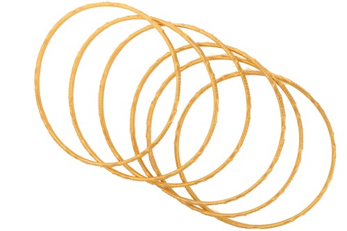 Lot 141 - A suite of six yellow metal bangles, in...