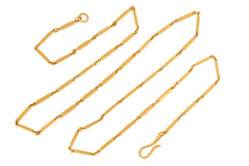 Lot 27 - A bar link chain necklace, of triangular prism...