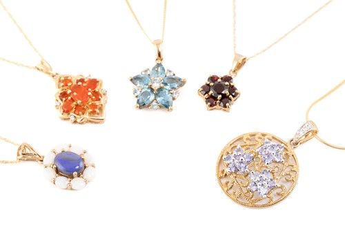 Lot 284 - Five 9ct gold gem-set cluster pendants on...