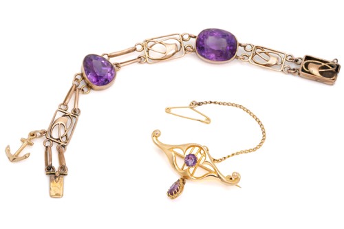 Lot 81 - A yellow metal and amethyst bracelet in the...