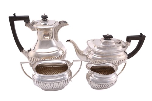 Lot 492 - An early 20th-century silver teaset, Sheffield...