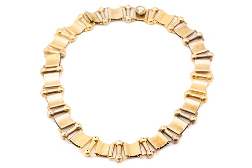 Lot 65 - A yellow metal book link chain necklace,...