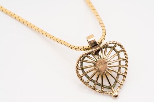 Lot 156 - A 9ct yellow gold heart pendant on chain, the...