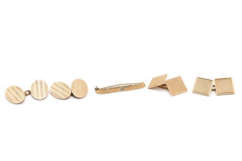 Lot 50 - A 9ct gold and diamond tie pin, fitted with...