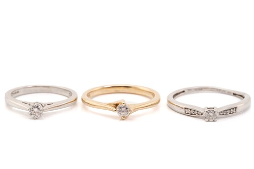 Lot 270 - Three diamond set rings, the first featuring a...