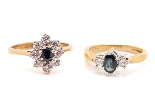 Lot 244 - A three stone half hoop sapphire and diamond...