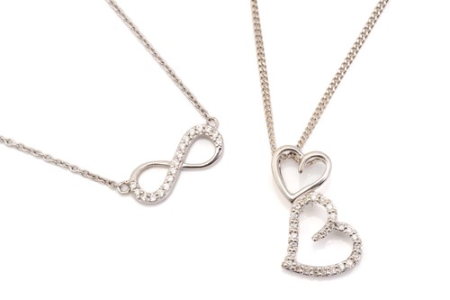Lot 226 - An 18ct white gold and diamond lemniscate...