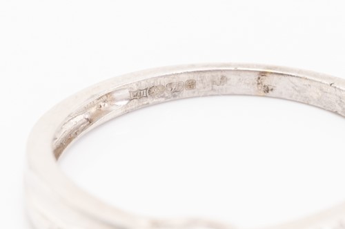 Lot 70 - A 9ct white gold and diamond cluster ring set...