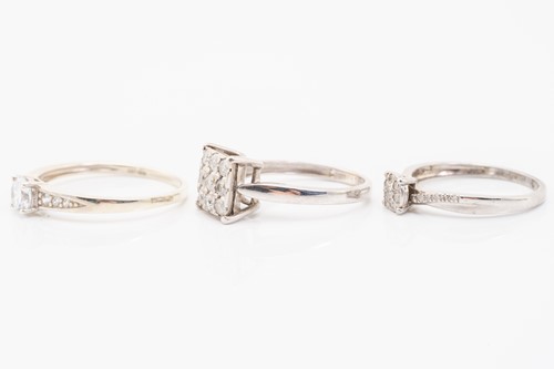 Lot 70 - A 9ct white gold and diamond cluster ring set...