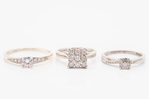 Lot 70 - A 9ct white gold and diamond cluster ring set...