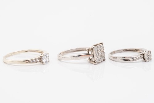 Lot 70 - A 9ct white gold and diamond cluster ring set...