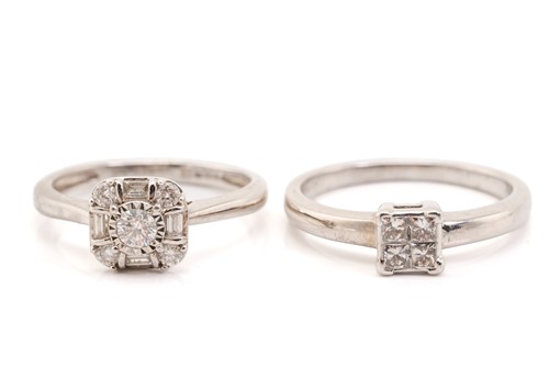 Lot 168 - Two diamond cluster rings in white gold; the...
