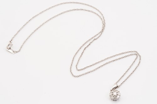Lot 202 - A diamond set cluster pendant and chain,...