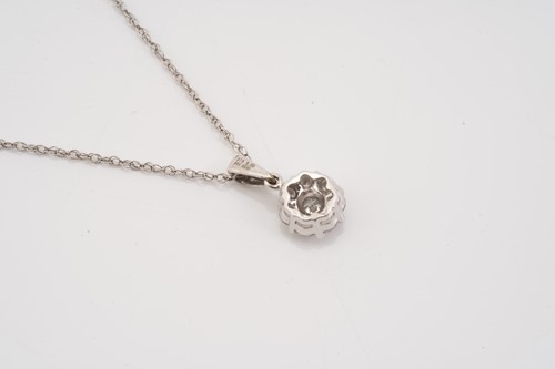 Lot 202 - A diamond set cluster pendant and chain,...