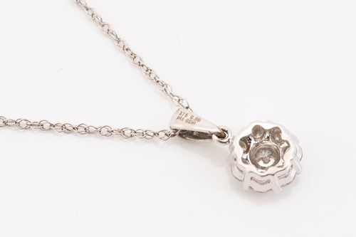 Lot 202 - A diamond set cluster pendant and chain,...
