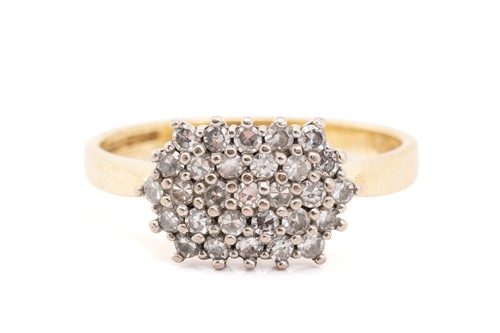 Lot 298 - A diamond set cluster panel ring, featuring...
