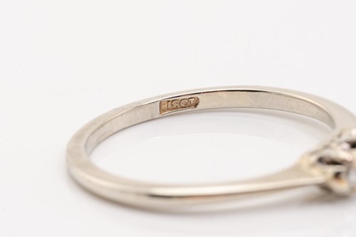 Lot 174 - Two diamond set rings, featuring a 9-stone...