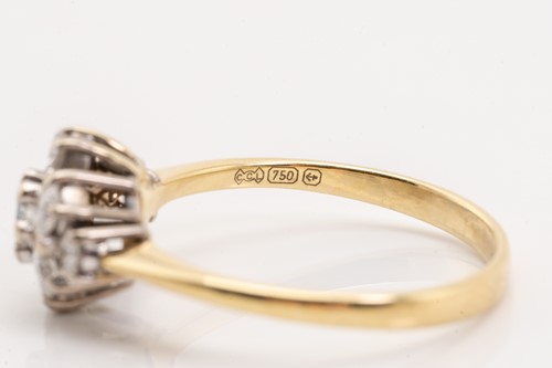Lot 174 - Two diamond set rings, featuring a 9-stone...