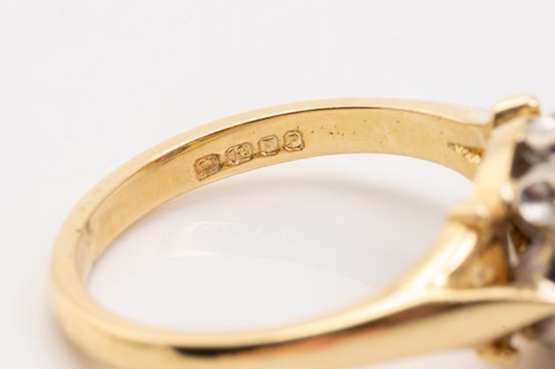 Lot 150 - An 18ct yellow gold, garnet, and diamond...