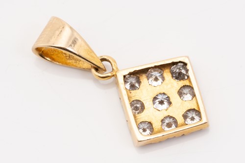 Lot 150 - An 18ct yellow gold, garnet, and diamond...