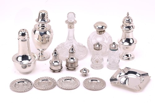 Lot 454 - A small collection of silver items including,...