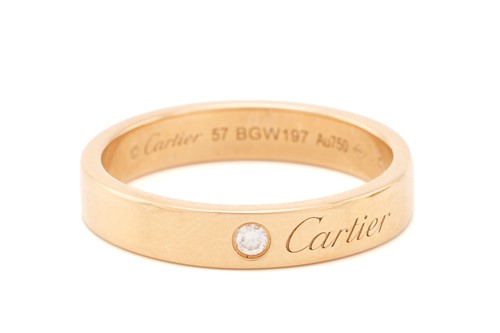 Lot 313 - Cartier. An 18ct gold and diamond set ring,...