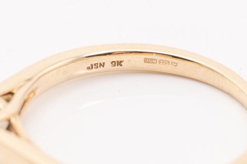 Lot 11 - Two single-stone diamond rings, the first...